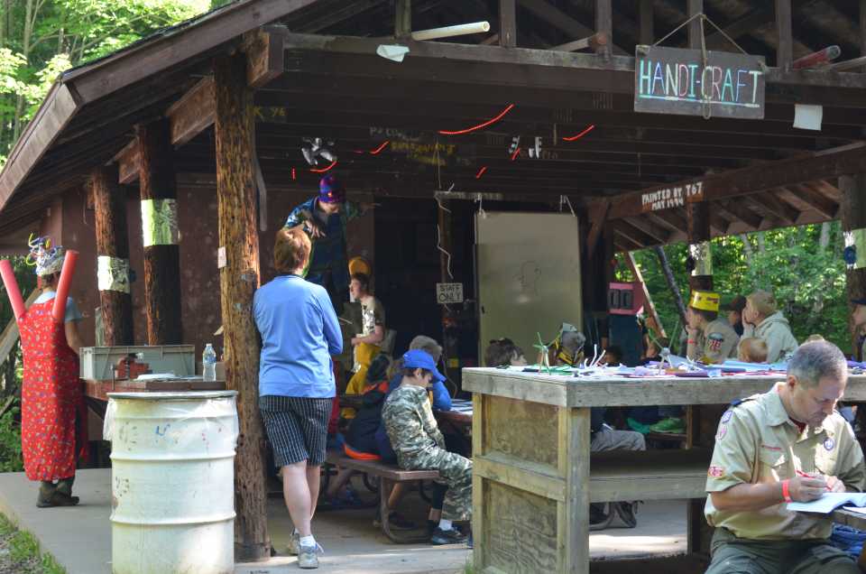 The handicraft work area and shop with workers moving in and out